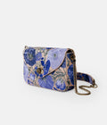 Ultramarine Blue hand-embroidered handbag from the AGNESTOTH Poppy collection — side view